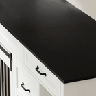 OnePaw ARDEA black countertop on a white wooden pet crate with black handles.