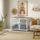 OnePaw Ares white pet crate in a living room with a couch, coffee table, and decorative items.