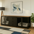 OnePaw ATHENA large black pet crate with wooden top in a room with a lamp, plant, and abstract art on the wall.