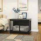 OnePaw AURELIA black pet crate in a living room setting with decor elements.