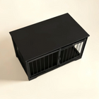 OnePaw AURELIA black metal pet crate on a beige background