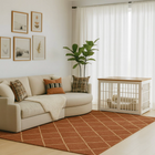 OnePaw AVENOR living room with beige sofa, decorative pillows, and a pet crate.