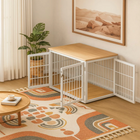 OnePaw AVENOR pet crate with wooden top in a room with a rug, plant, and framed picture.