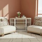 OnePaw EIRENE modern living room with beige sofa, side table, and a pet crate.