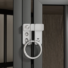OnePaw EIRENE metal door handle and latch on a wooden crate door.