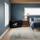 OnePaw EIRENE modern bedroom with a dog in a crate, blue walls, and wooden floors.