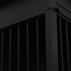 OnePaw EMBER close-up of a black metal gate with vertical bars