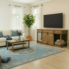 OnePaw EMBER living room with a wooden pet crate integrated into a entertainment center.