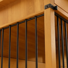 OnePaw EMBER close-up of a wooden pet crate with black metal railing