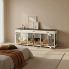 Modern pet crate with beds inside a stylish room.