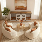 OnePaw HAVEN modern living room with white sofa, wooden coffee table, and a pet crate.