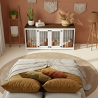OnePaw LIVIA living room with a pet crate, round rug, and decorative pillows.