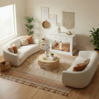 OnePaw LYRA living room with white sofas, a coffee table, and wooden pet crate.