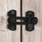 OnePaw LYRA black metal latch on a wooden pet crate door.