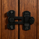OnePaw LYRA black door latch on a wooden pet crate door.