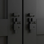 Close-up of black cabinet handles on a dark surface