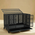 Black metal pet cage on a beige background