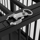 Metal latch mechanism on a black metal structure
