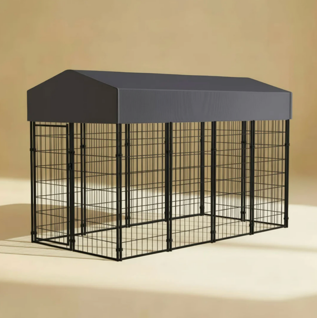 Black wire pet cage with a gray cover on a beige background