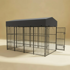 Large black metal dog crate with a cover on a beige background