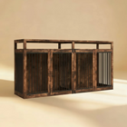 Wooden pet crate with metal bars on a beige background