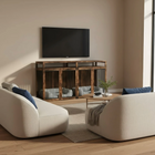 Modern living room with beige sofas, wooden pet crate, and flat-screen TV.