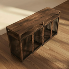 Wooden pet crate with a wooden top on a wooden floor