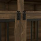 Close-up of wooden doors with metal hinges against a blurred wooden background