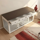 Modern console table with drawers and pet crate in a living room setting