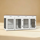 White pet crate with metal doors on a beige background