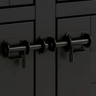 OnePaw Vesta close-up of black metal furniture crate doors with handles