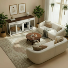 OnePaw Vesta living room with white sectional sofa, wooden coffee table, and pet crate.