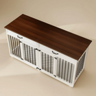 OnePaw Vesta wooden furniture crate with a dark brown top and white base with black bars on a beige background
