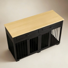OnePaw Vesta black pet crate with a beige top on a neutral background
